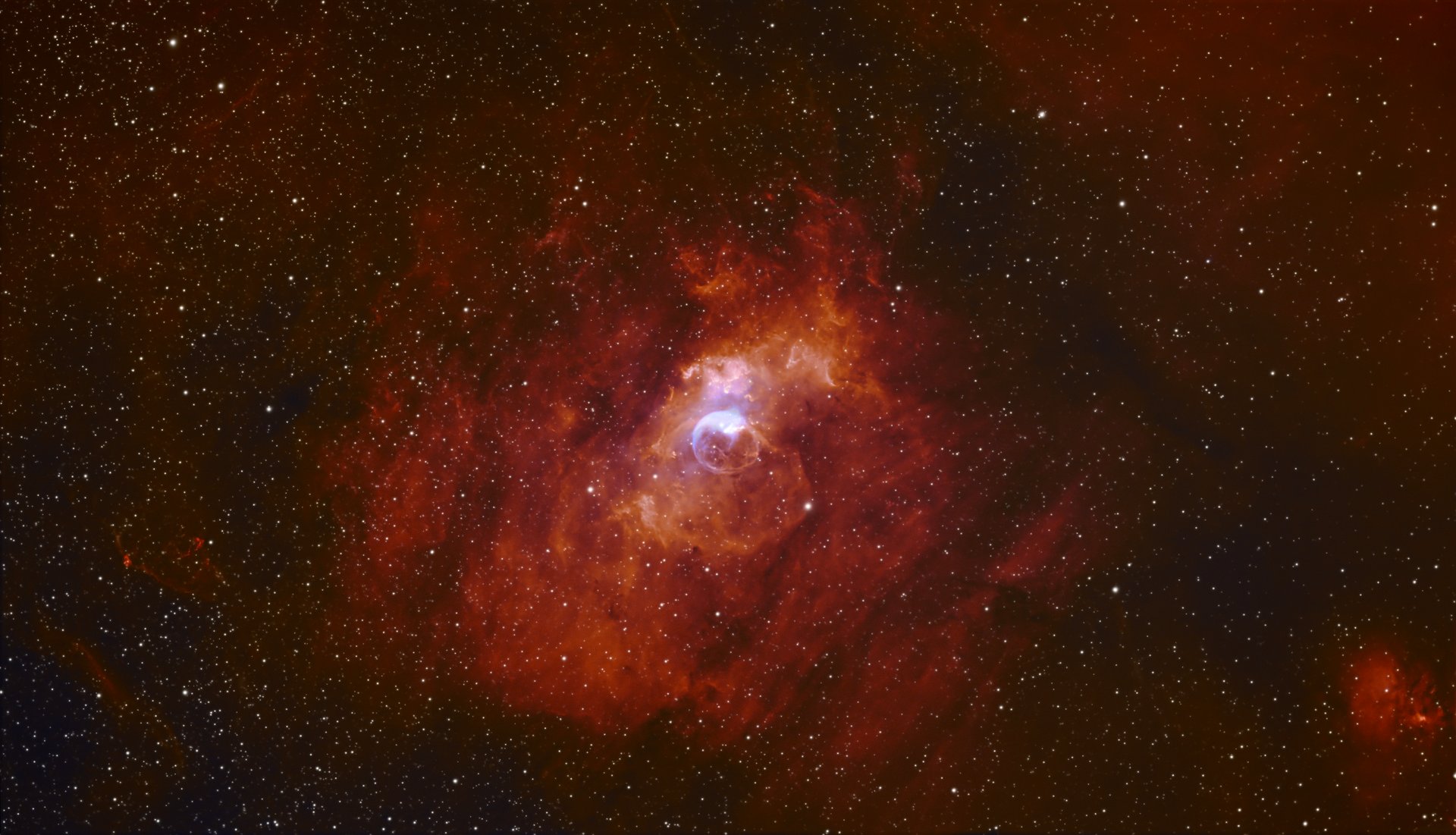 Stunning cosmic image of the Bubble Nebula surrounded by stars in deep space.